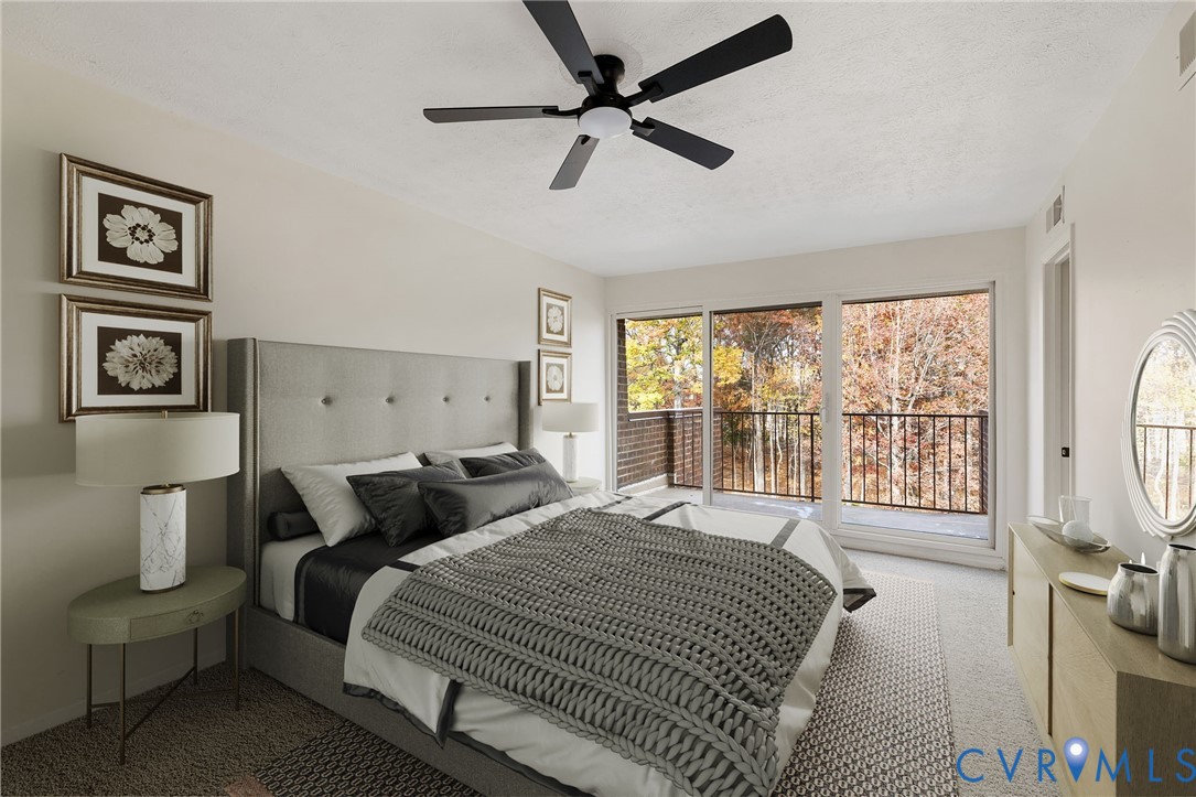 1501 Largo Road, Unit 301 Henrico, VA 23238 - Photo 22 of 40 a bedroom with a bed a couch and a large window