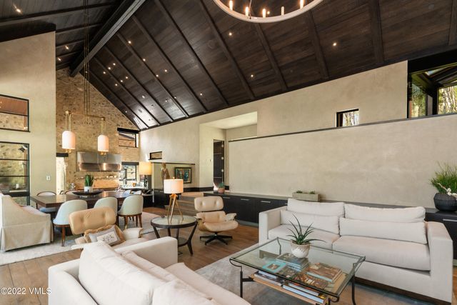 a living room with lots of furniture and rug