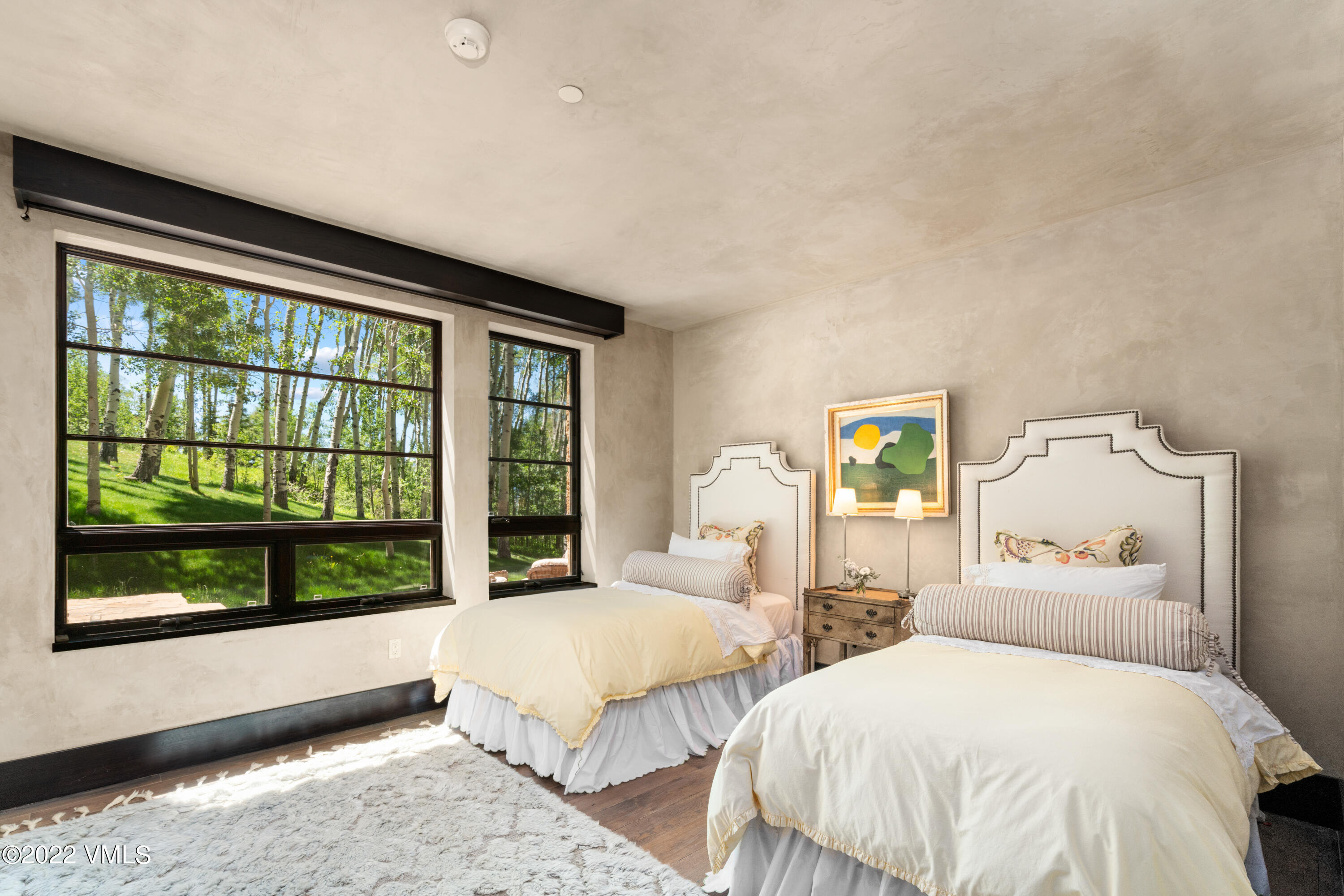 275 Wildrose Avon, CO 81620 - Photo 34 of 44 a bedroom with two beds and large window