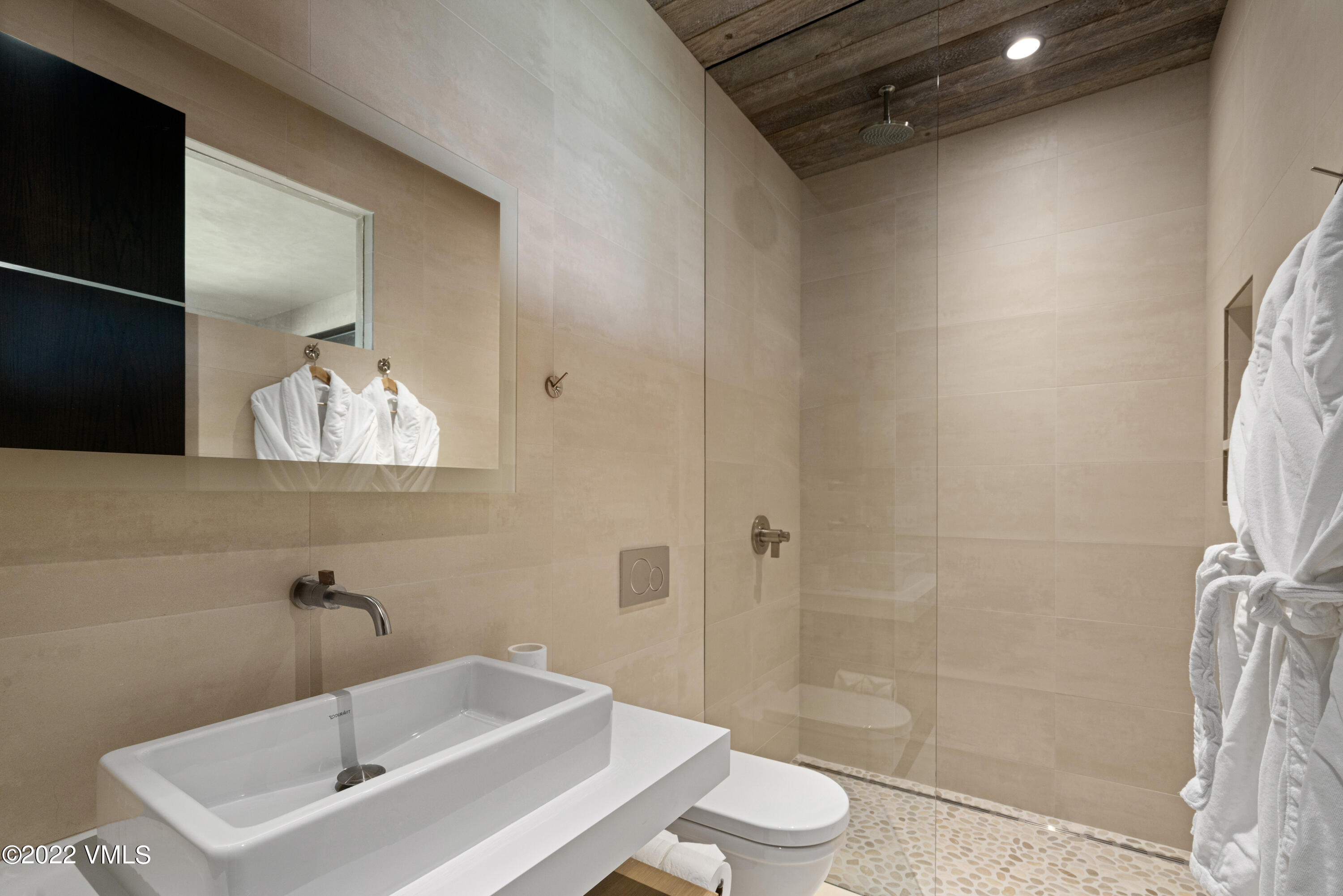 275 Wildrose Avon, CO 81620 - Photo 42 of 44 a bathroom with a sink toilet and shower