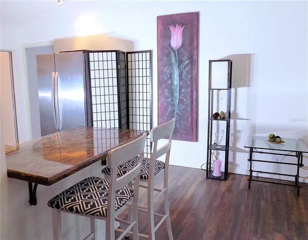 a view of livingroom with furniture and wooden floor