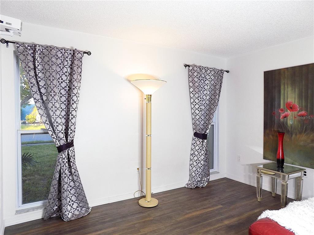 7344 Como Drive New Port Richey, FL 34655 - Photo 24 of 34 a view of entryway with wooden floor