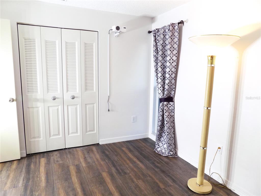 7344 Como Drive New Port Richey, FL 34655 - Photo 26 of 34 a view of entryway with wooden floor