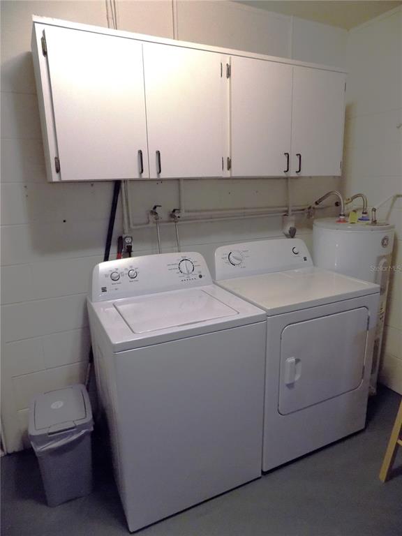 7344 Como Drive New Port Richey, FL 34655 - Photo 27 of 34 a utility room with dryer and washer