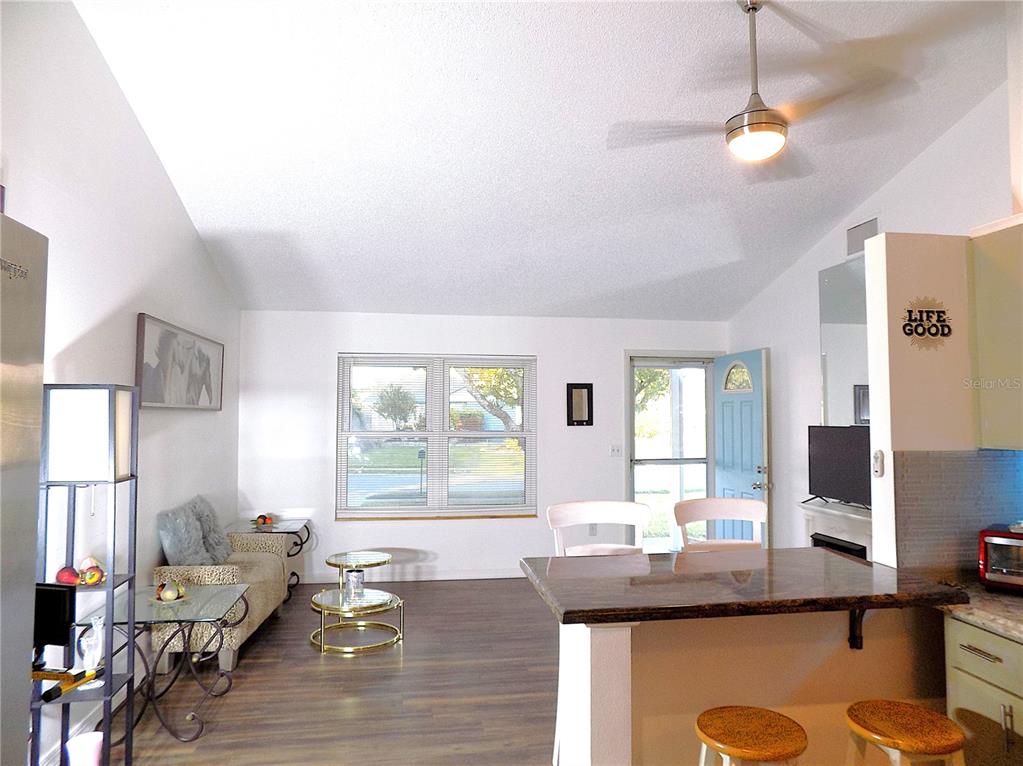 7344 Como Drive New Port Richey, FL 34655 - Photo 4 of 34 a room with furniture and a window