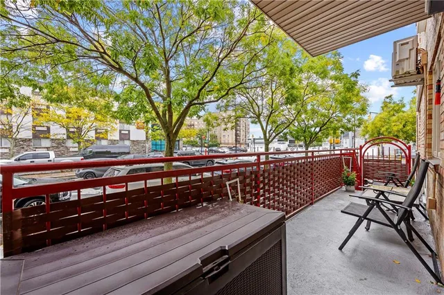 a view of a bench in wooden floor