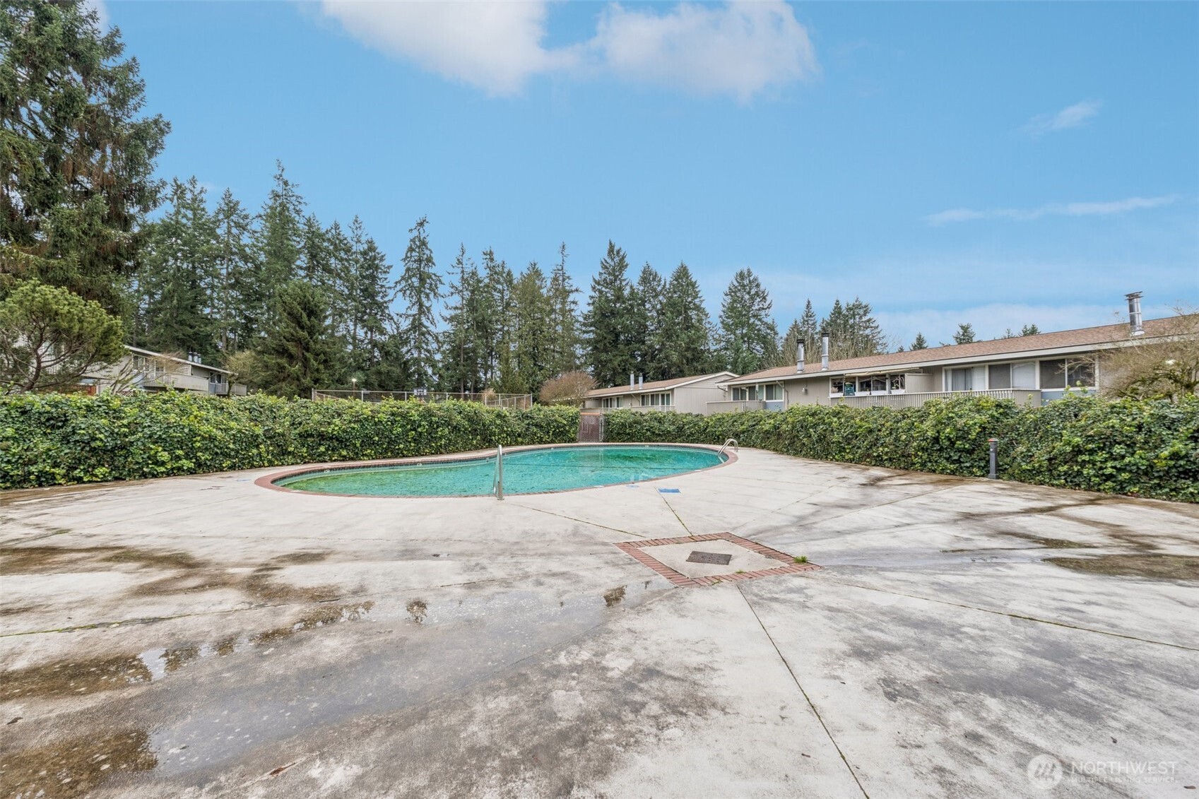 9623 South 248th Street, Unit G5 Kent, WA 98030 - Photo 21 of 23 a view of a road with a yard