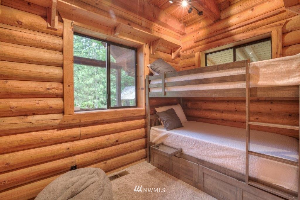 24107 Brooks Road East Orting, WA 98360 - Photo 11 of 40 a bed room with a bed