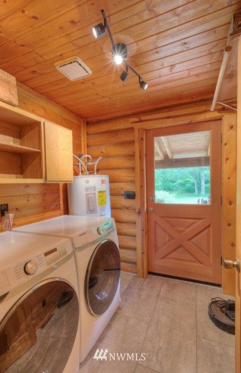 24107 Brooks Road East Orting, WA 98360 - Photo 14 of 40 a utility room with dryer and washer
