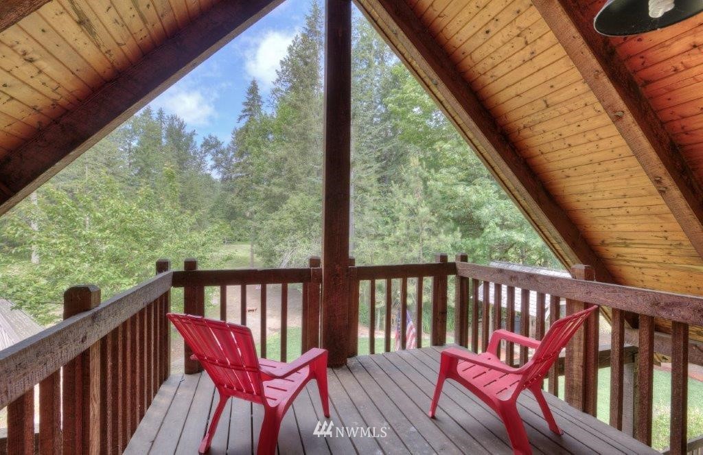 24107 Brooks Road East Orting, WA 98360 - Photo 17 of 40 a view of a two chairs in the balcony