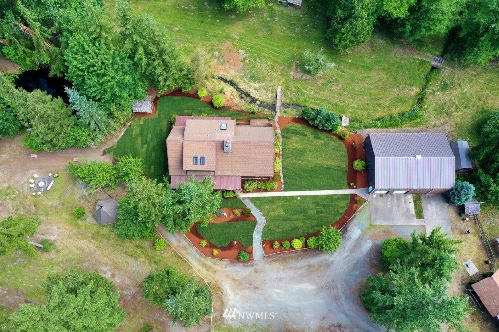 24107 Brooks Road East Orting, WA 98360 - Photo 30 of 40 an aerial view of a house with garden space and street view
