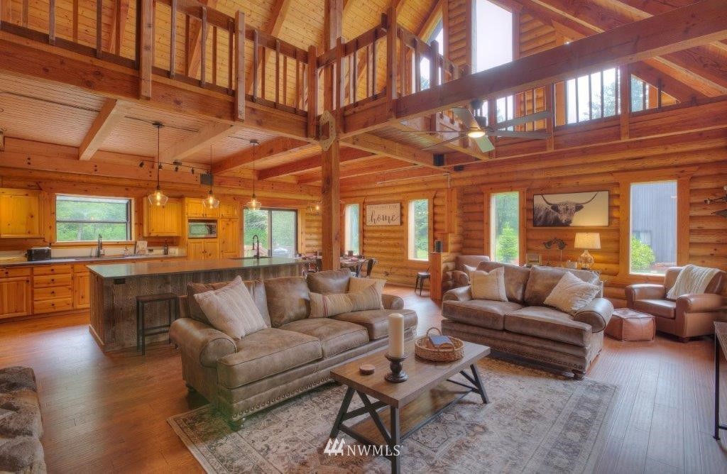 24107 Brooks Road East Orting, WA 98360 - Photo 7 of 40 a living room with furniture and a large window