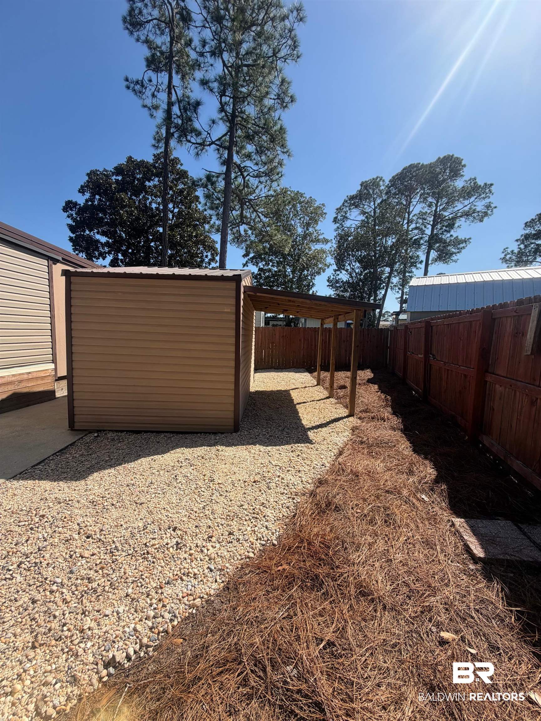 685 Escambia Loop Lillian, AL 36549 - Photo 21 of 43 View of fenced backyard