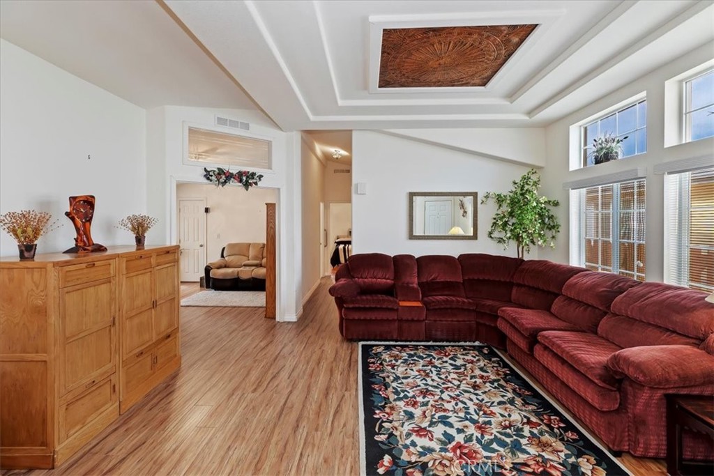 27250 Murrieta Road, Unit 298 Menifee, CA 92586 - Photo 12 of 54 a living room with furniture and a couch