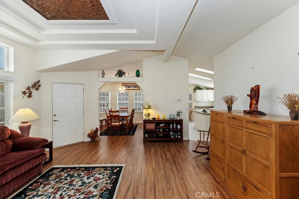 27250 Murrieta Road, Unit 298 Menifee, CA 92586 - Photo 14 of 54 a living room with furniture and wooden floor