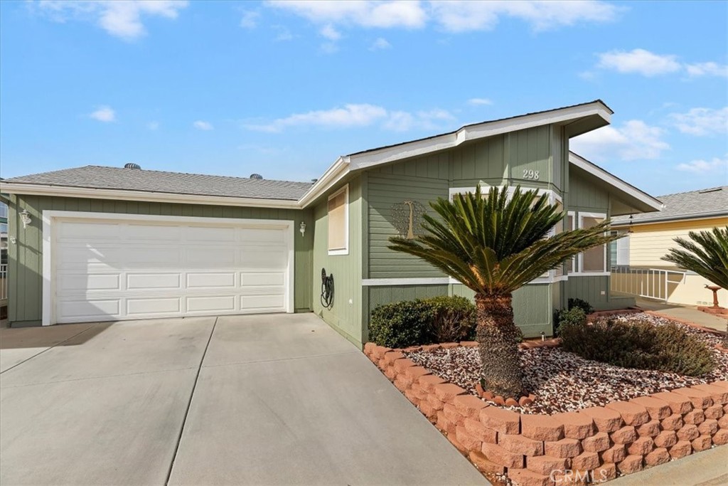27250 Murrieta Road, Unit 298 Menifee, CA 92586 - Photo 3 of 54 a view of a house with a outdoor space
