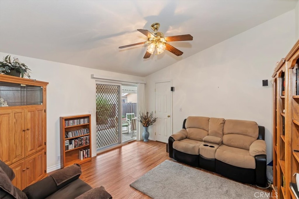 27250 Murrieta Road, Unit 298 Menifee, CA 92586 - Photo 34 of 54 a living room with furniture and wooden floor