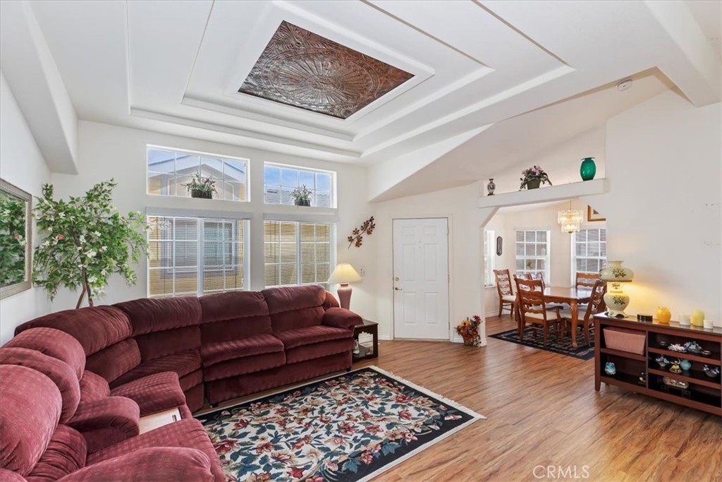 27250 Murrieta Road, Unit 298 Menifee, CA 92586 - Photo 9 of 54 a living room with furniture and wooden floor