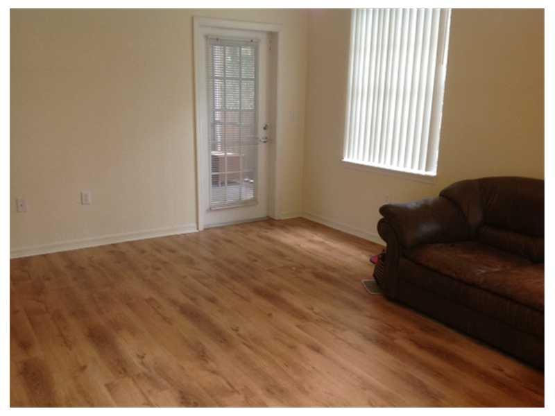6846 West Sample Road, Unit B30 Coral Springs, FL 33067 - Photo 2 of 8 Living Room