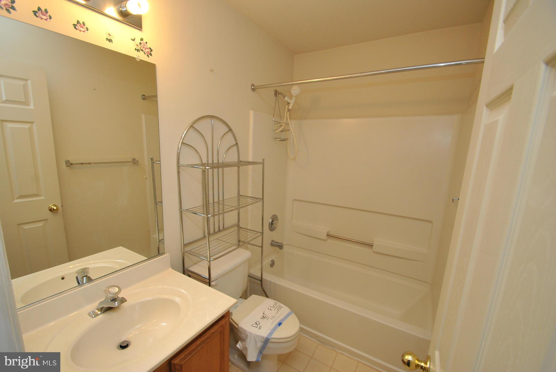 6604 Ridgeborne Drive Baltimore, MD 21237 - Photo 16 of 23 UPPER LEVEL HALL BATH