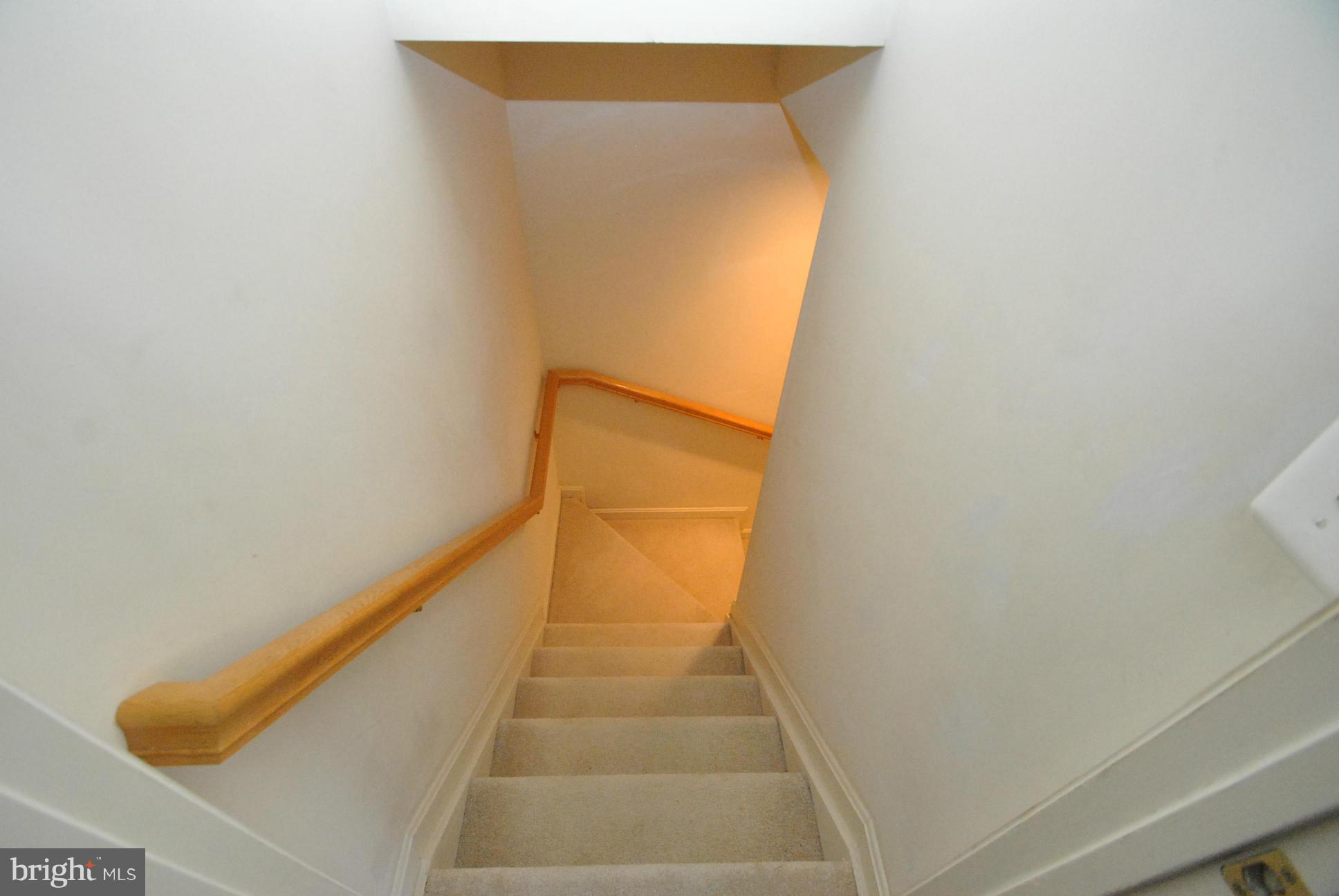 6604 Ridgeborne Drive Baltimore, MD 21237 - Photo 18 of 23 STAIRS TO FULLY FINISHED LOWER LEVEL