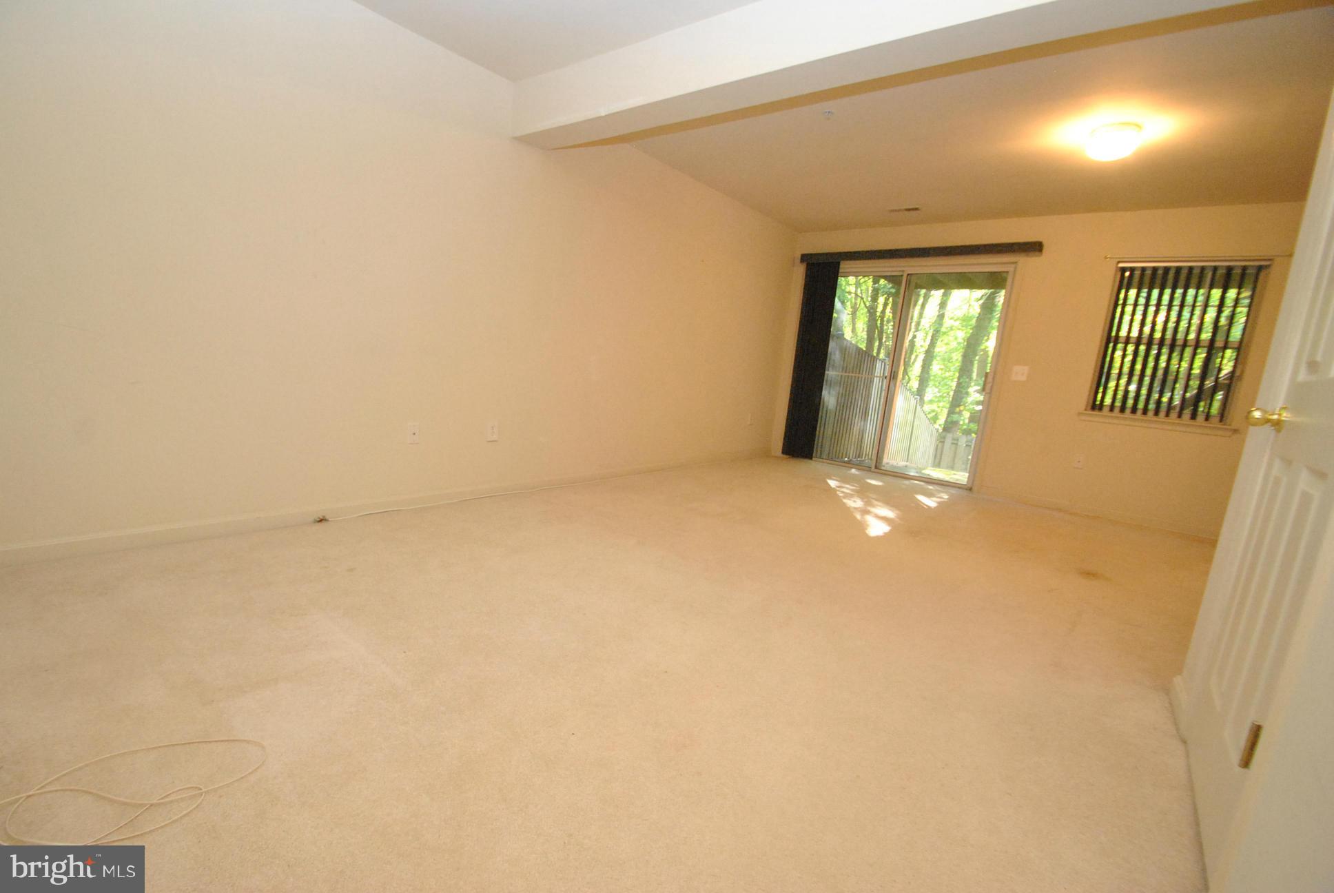6604 Ridgeborne Drive Baltimore, MD 21237 - Photo 20 of 23 FULLY FINISHED WALKOUT BASEMENT W/FIREPLACE