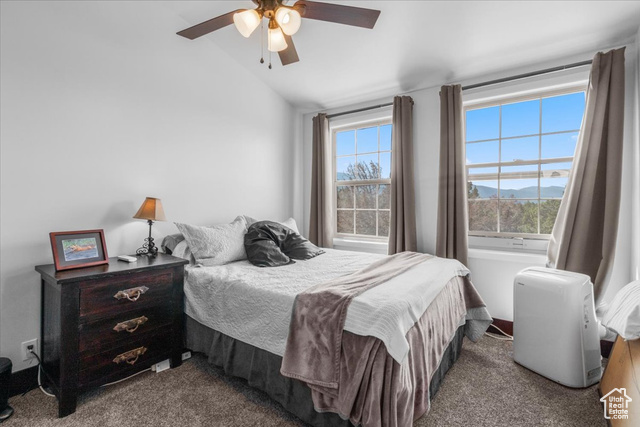 11450 Pigeon Hollow Road Spring City, UT 84662 - Photo 14 of 47 Bedroom with dark colored carpet, lofted ceiling, and ceiling fan