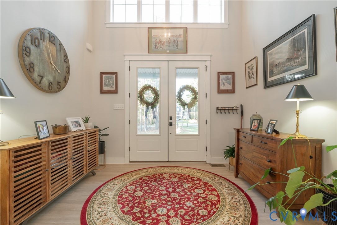2591 Shaughnessy Road Powhatan, VA 23139 - Photo 14 of 50 a living room with furniture and a window