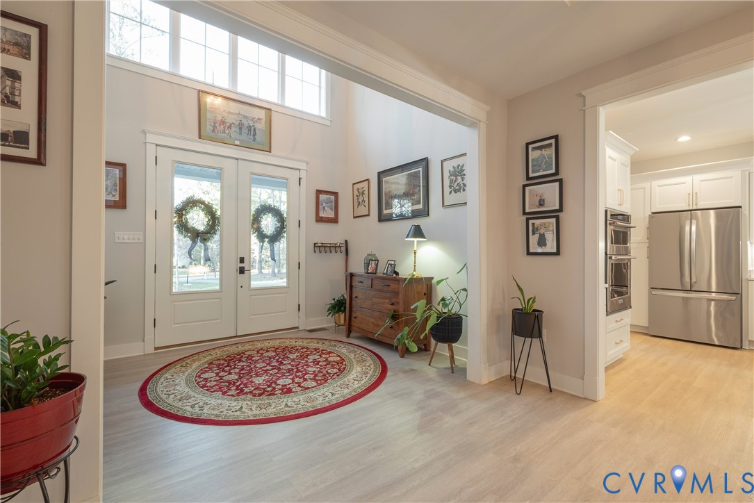 2591 Shaughnessy Road Powhatan, VA 23139 - Photo 16 of 50 a view of a livingroom with furniture and windows