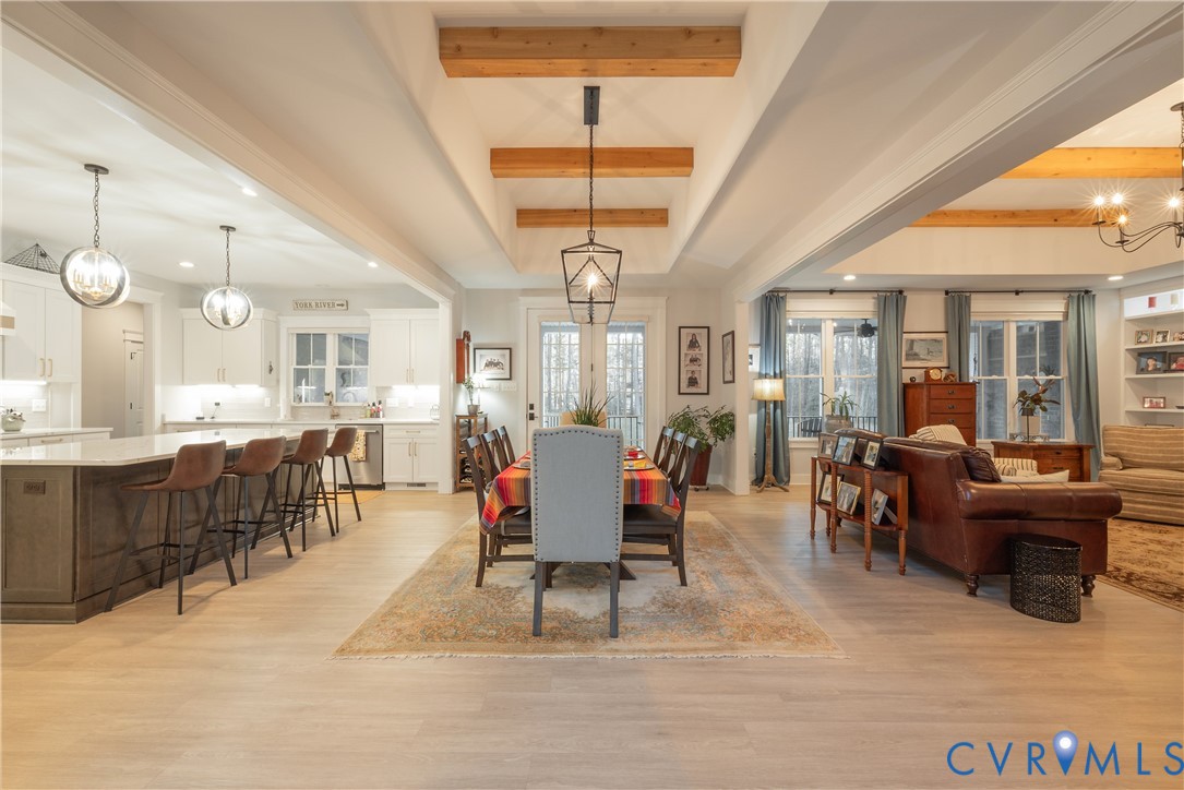 2591 Shaughnessy Road Powhatan, VA 23139 - Photo 17 of 50 a room with lots of tables a large window and chairs