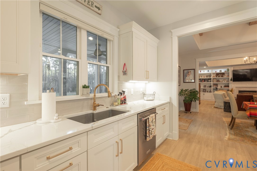 2591 Shaughnessy Road Powhatan, VA 23139 - Photo 27 of 50 a kitchen with a sink and a refrigerator