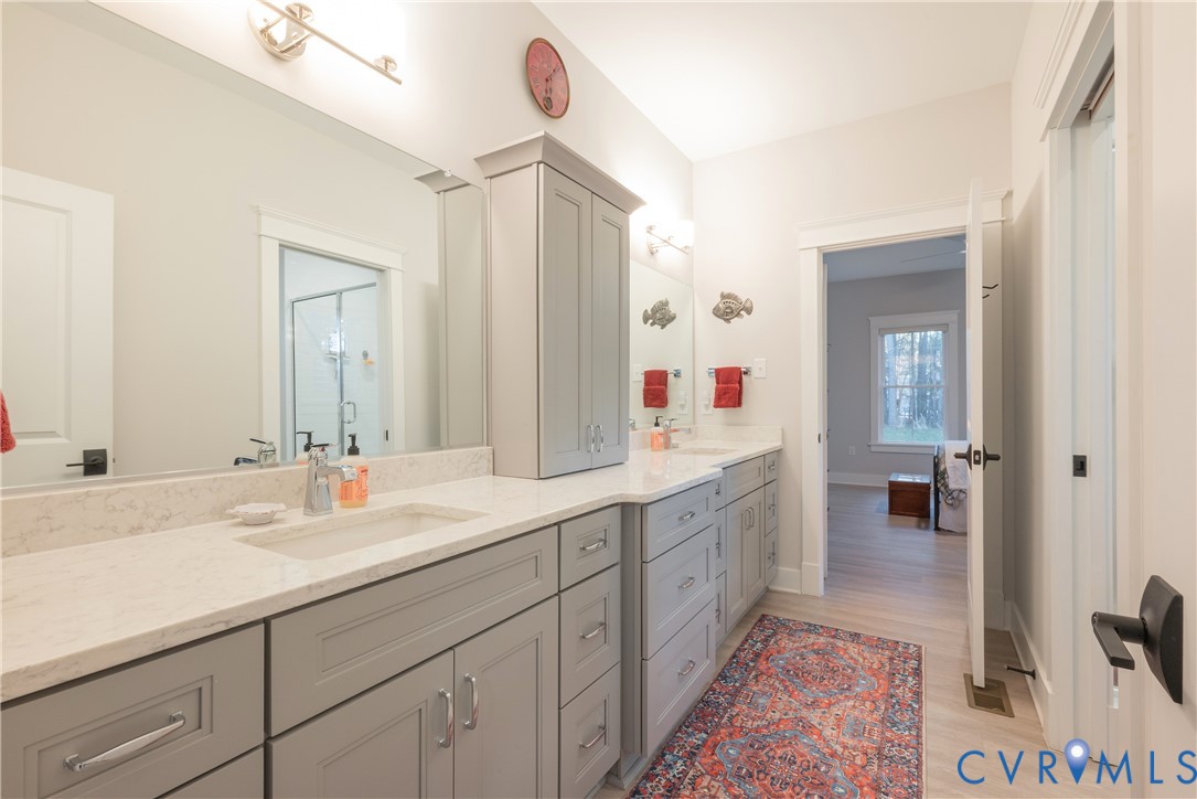 2591 Shaughnessy Road Powhatan, VA 23139 - Photo 38 of 50 a spacious bathroom with a double vanity sink mirror and