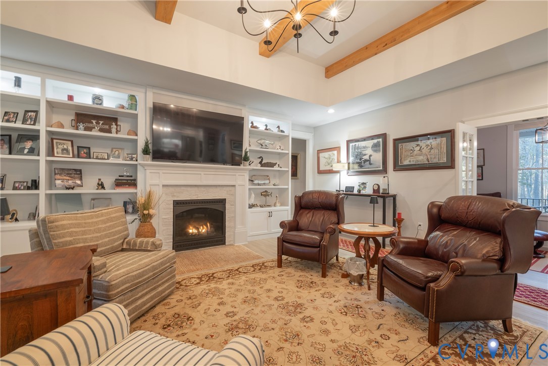 2591 Shaughnessy Road Powhatan, VA 23139 - Photo 43 of 50 a living room with furniture and a fireplace