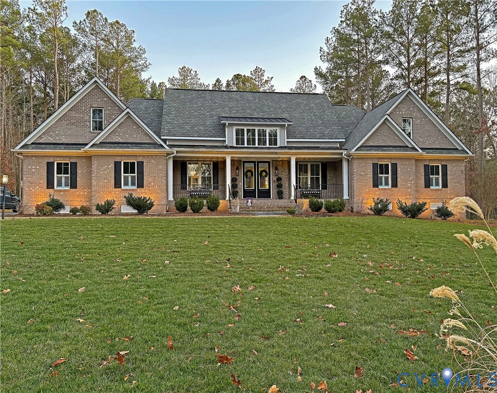 2591 Shaughnessy Road Powhatan, VA 23139 - Photo 50 of 50 front view of a house with a yard