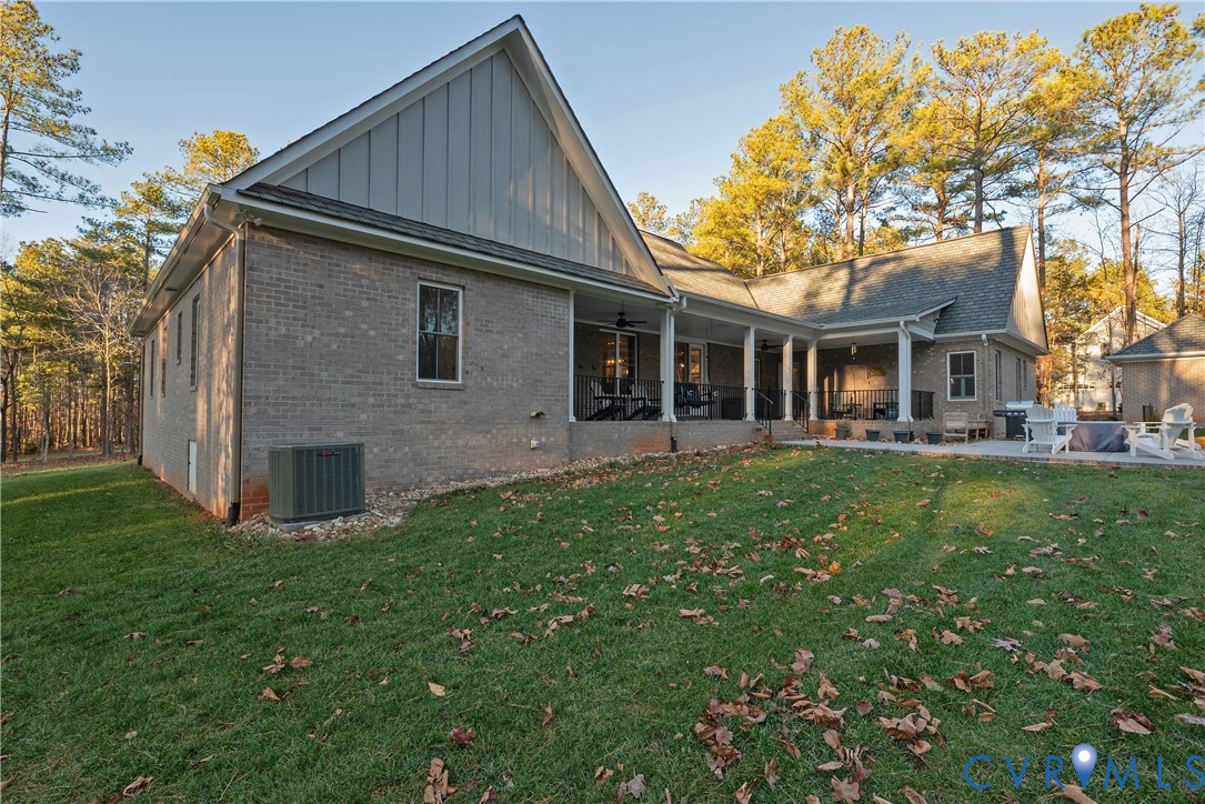 2591 Shaughnessy Road Powhatan, VA 23139 - Photo 6 of 50 a front view of a house with garden