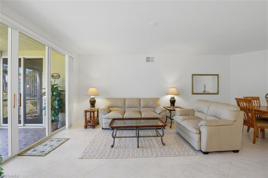 23820 San Marino Road, Unit 102 Estero, FL 34135 - Photo 11 of 28 View of tiled living room