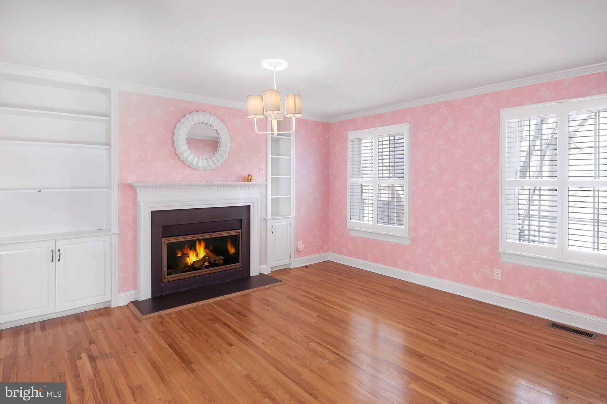 3 Governors Lane Princeton, NJ 08540 - Photo 14 of 26 a view of an empty room with wooden floor fireplace and a window