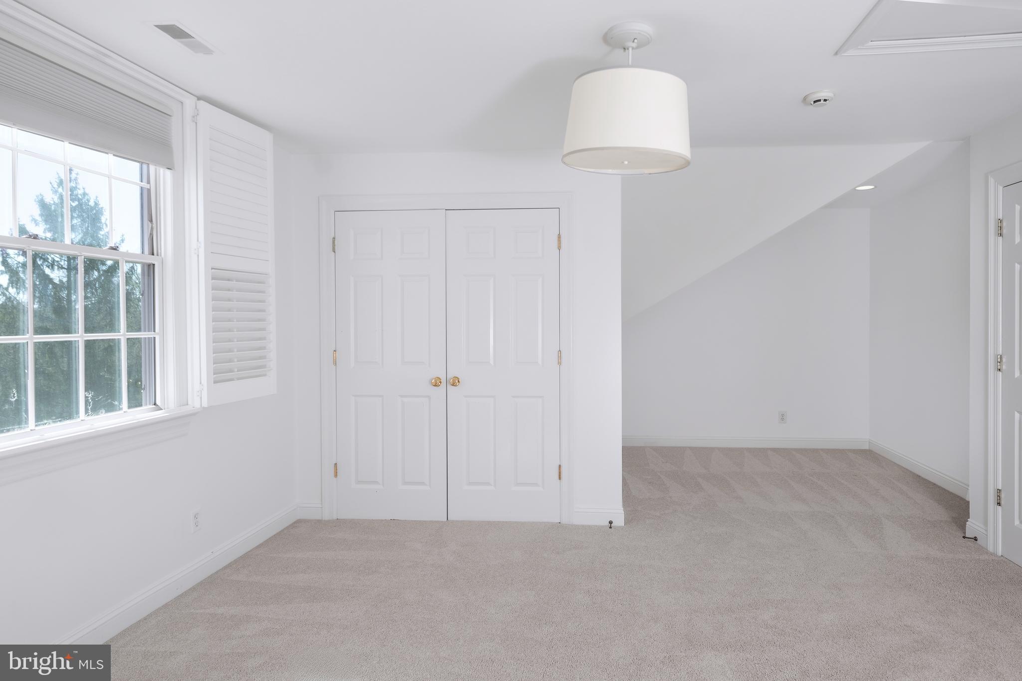 3 Governors Lane Princeton, NJ 08540 - Photo 18 of 26 a view of an empty room with a window