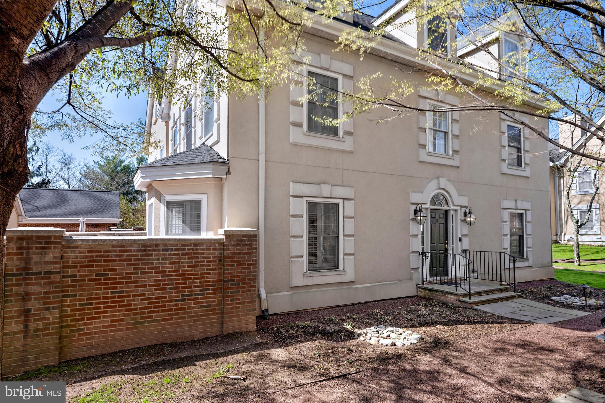 3 Governors Lane Princeton, NJ 08540 - Photo 2 of 26 a view of a brick house with many windows