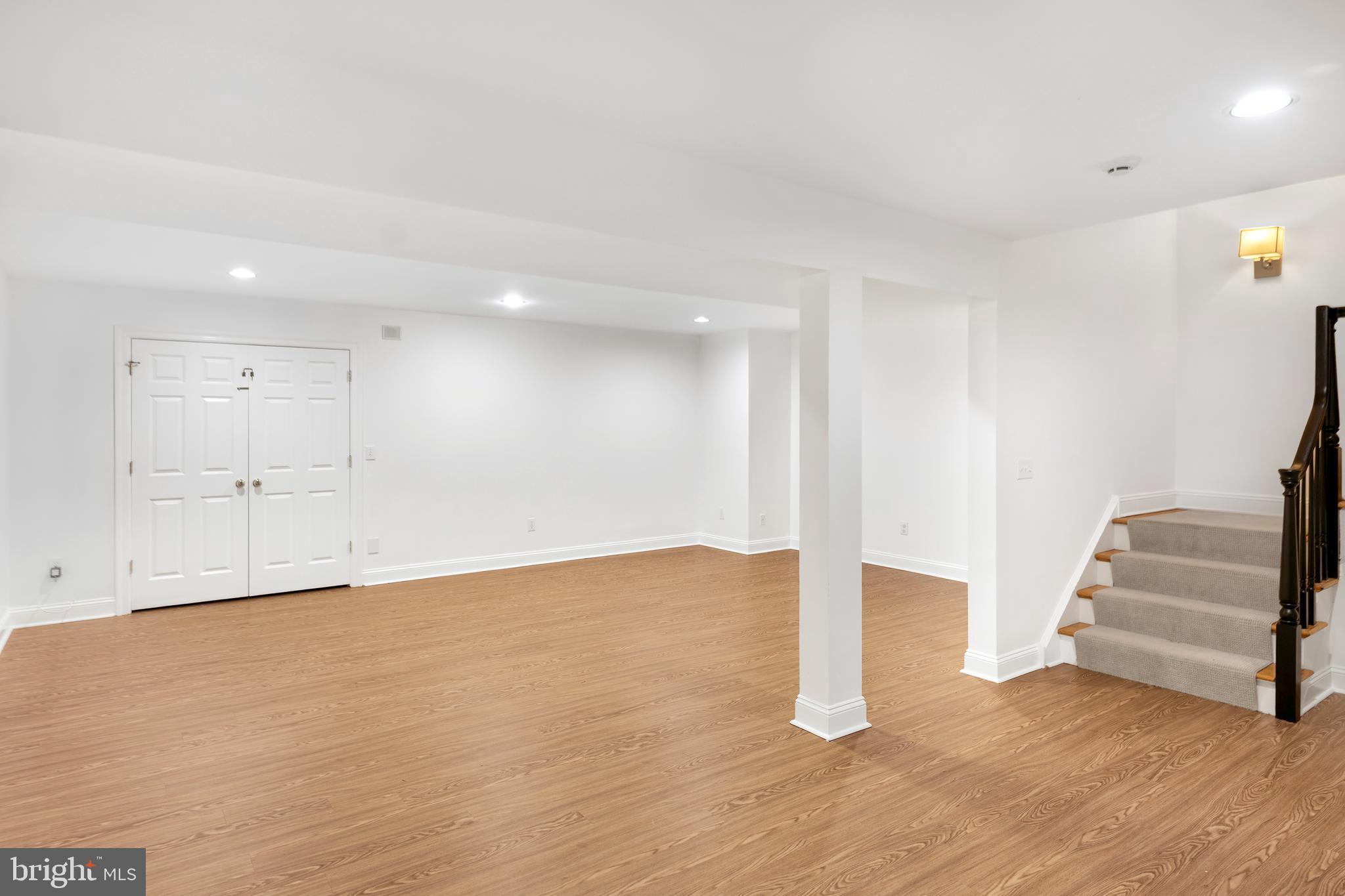 3 Governors Lane Princeton, NJ 08540 - Photo 22 of 26 a view of an empty room with wooden floor and windows