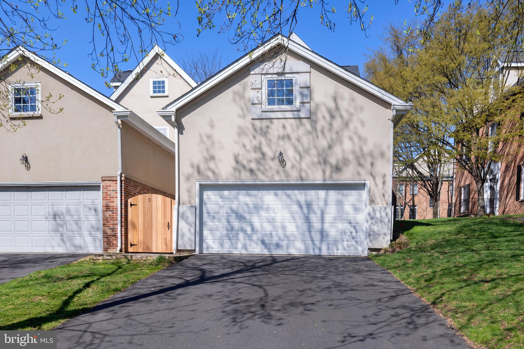 3 Governors Lane Princeton, NJ 08540 - Photo 24 of 26 a front view of a house with a yard and garage