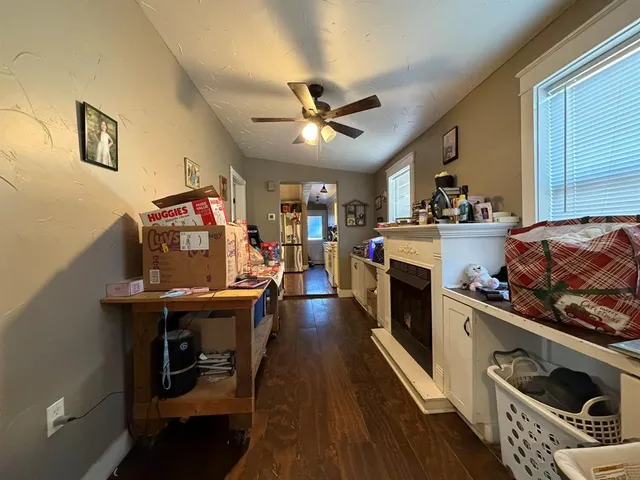 a kitchen with stove and cabinets