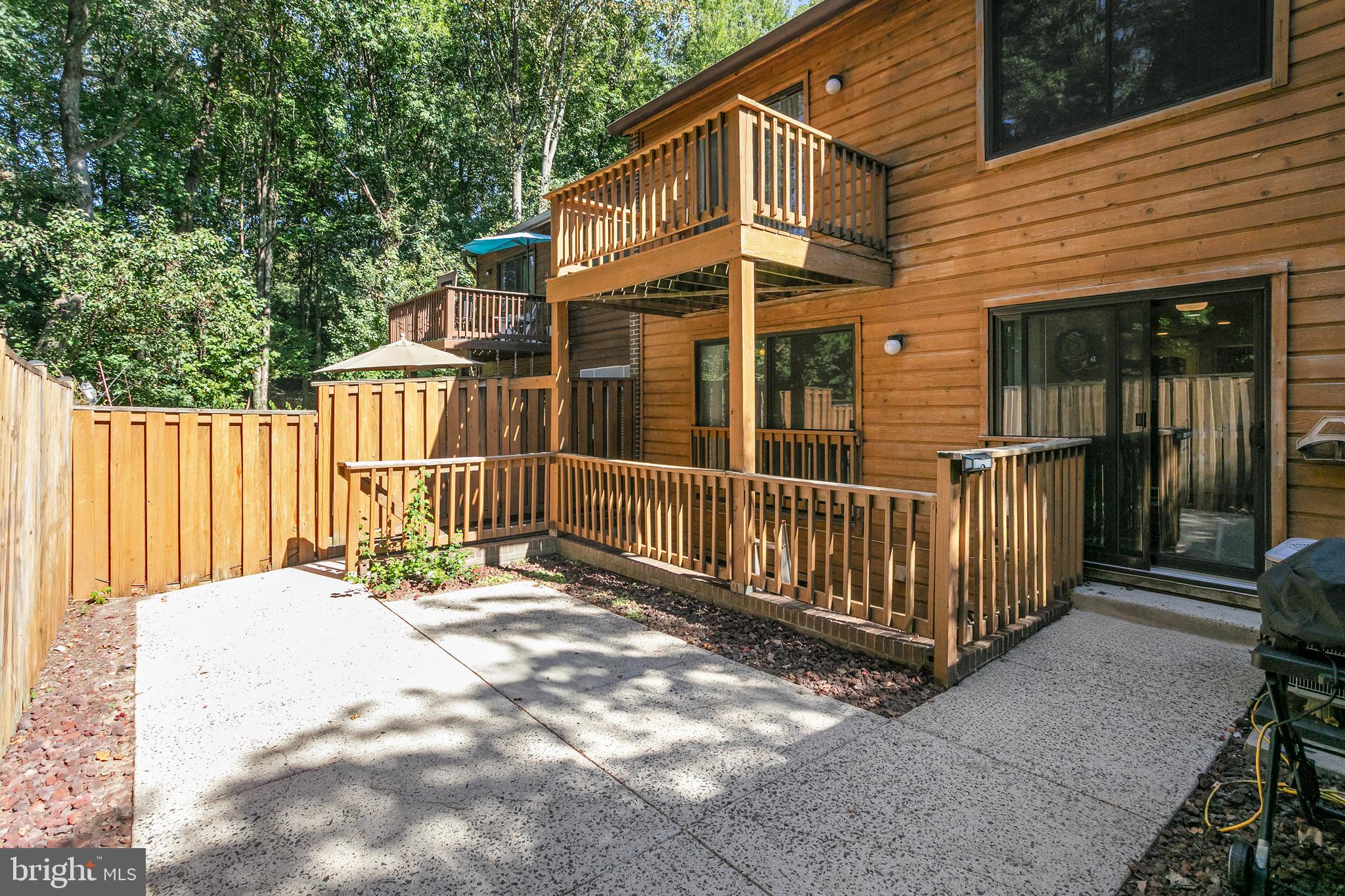 2213 Cedar Cove Court Reston, VA 20191 - Photo 21 of 40 a view of a house with wooden fence