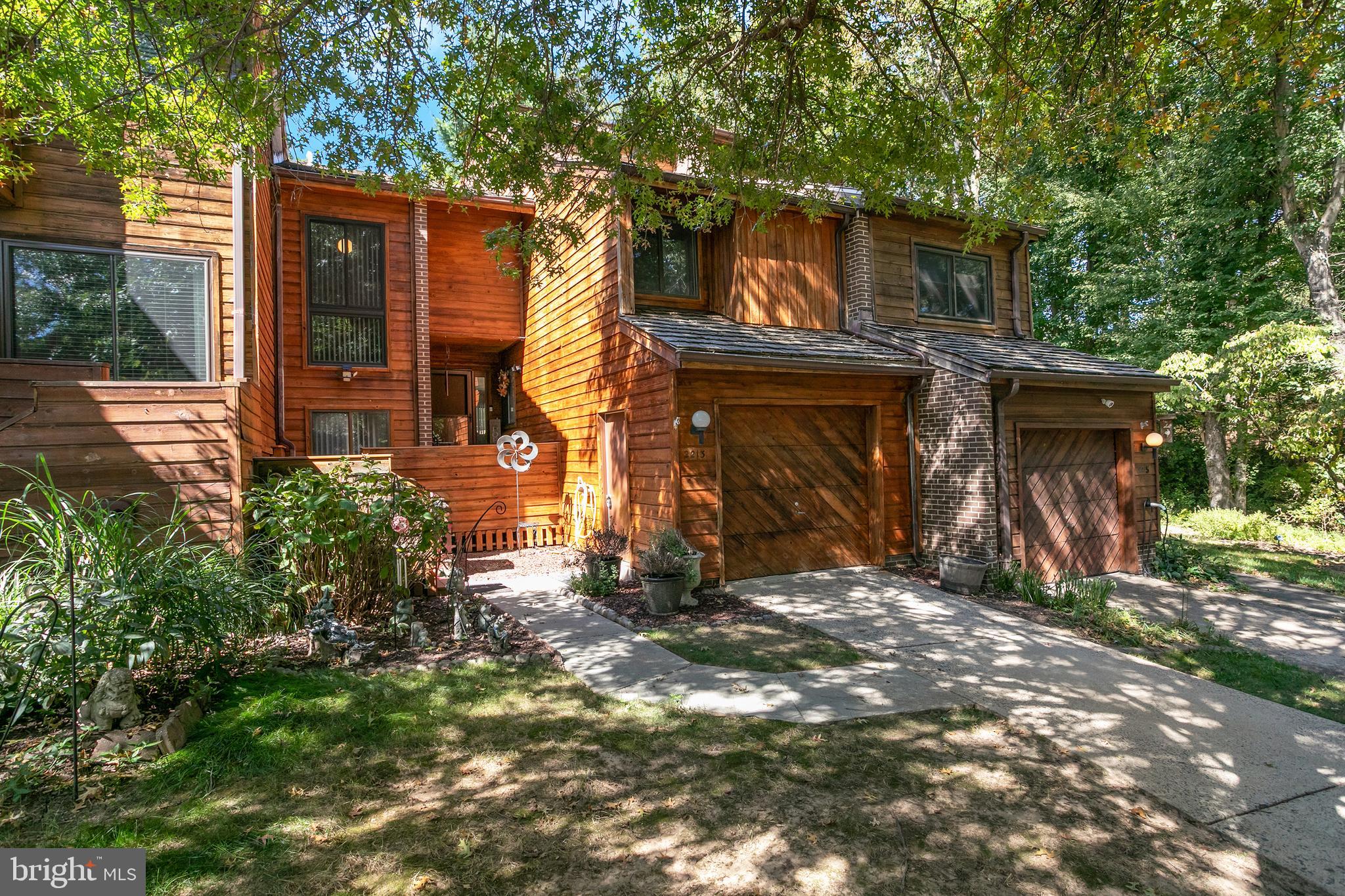 2213 Cedar Cove Court Reston, VA 20191 - Photo 24 of 40 front view of a house with a trees