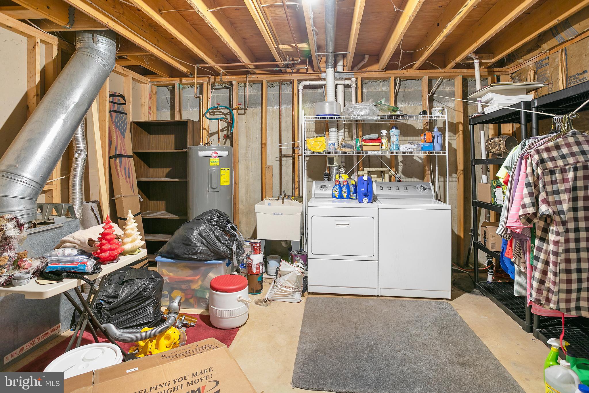 2213 Cedar Cove Court Reston, VA 20191 - Photo 30 of 40 a storage room with washer and dryer