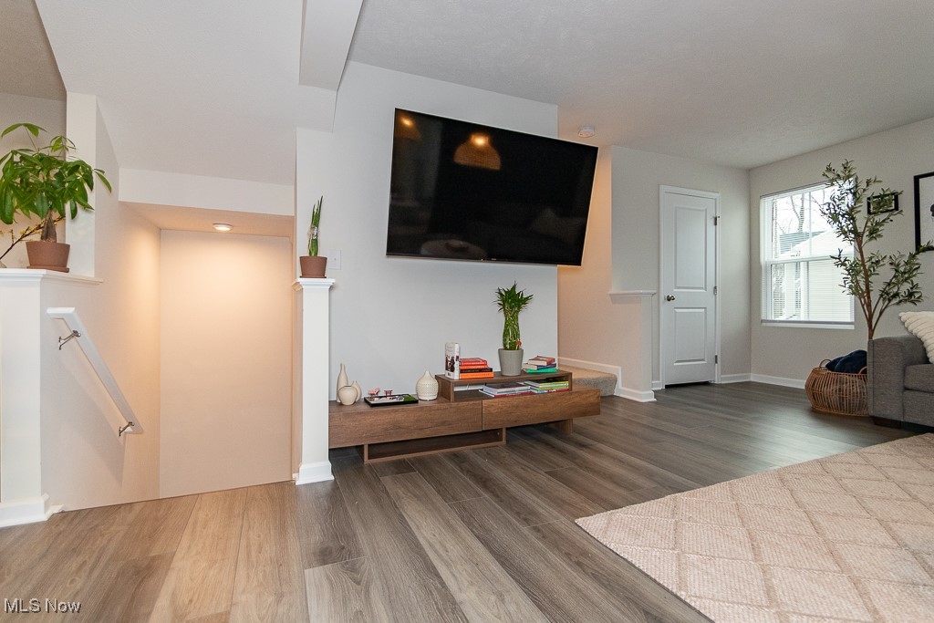 192 Raintree Lane Painesville, OH 44077 - Photo 9 of 23 Living room featuring wood-type flooring