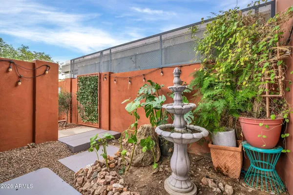 a kitchen with stainless steel appliances a refrigerator and a stove