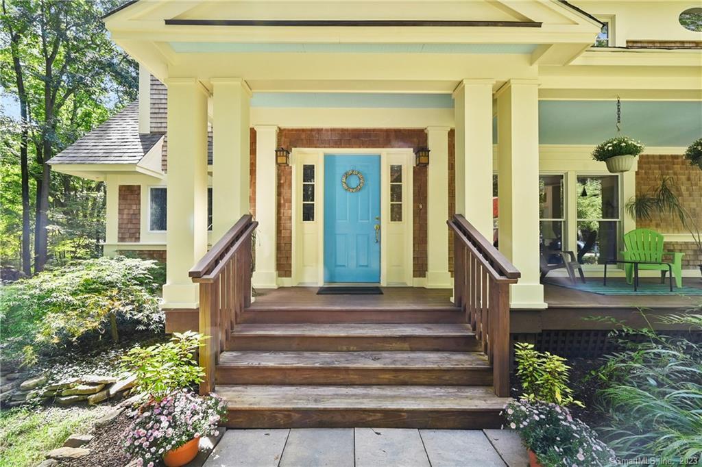 55 Gallows Hill Road Redding, CT 06896 - Photo 1 of 1 a front view of a house with a garden