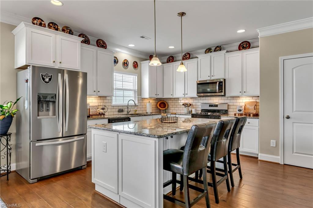 102 Radiant Path Trinity, NC 27370 - Photo 9 of 43 Spacious eat-in kitchen island with storage