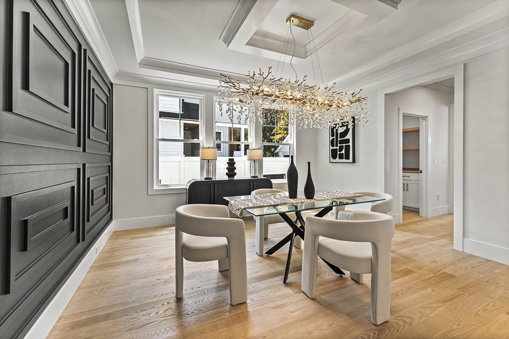 59 Henderson Street Needham, MA 02492 - Photo 12 of 32 a view of a livingroom with furniture window and wooden floor
